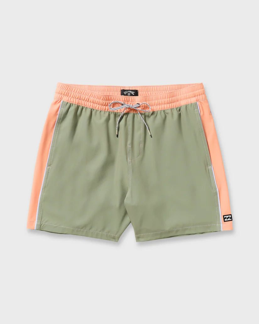Green shorts with pink waistband and side panels on a light gray background 6