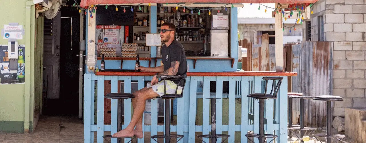 Guy chilling at the bar by the beach